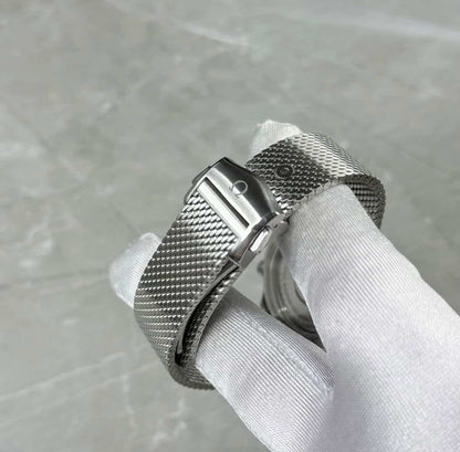 Omega Seamaster Diver 300M clasp-side close-up showing mesh texture and adjustment holes.