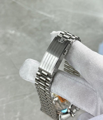 Omega Speedmaster close-up of the ridged folding clasp and bracelet.